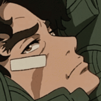 A Man With A Bandage On His Face Is Laying Down GIF