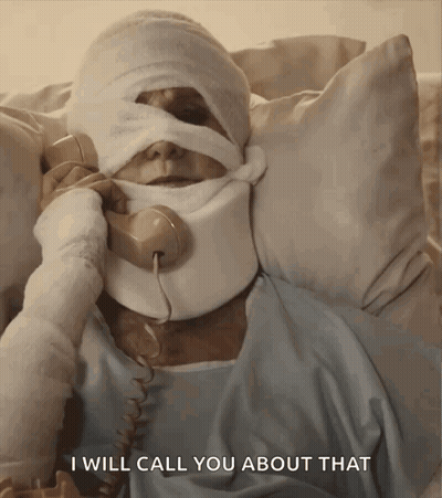 A Man With A Bandage On His Face Is Talking On A Telephone And Says " I Will Call You About That " GIF