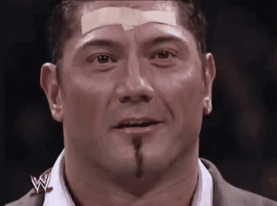 A Man With A Bandage On His Forehead And A W Logo On His Shirt GIF