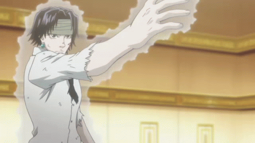 A Man With A Bandage On His Forehead Is Standing In A Room With His Arm Outstretched GIF