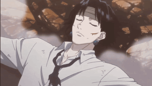 A Man With A Bandage On His Forehead Laying Down With His Eyes Closed GIF