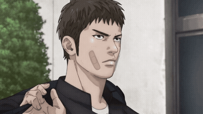 A Man With A Bandage On His Forehead Looks Angry GIF