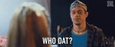 A Man With A Bandana On His Head Is Talking To A Woman And Says Who Dat GIF