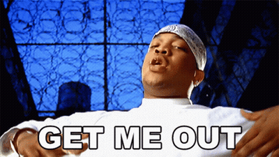 A Man With A Bandana On His Head Says " Get Me Out " GIF