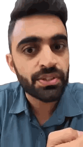 A Man With A Beard And A Blue Shirt Is Making A Funny Face Sticker