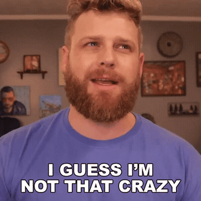 A Man With A Beard And A Blue Shirt Says I Guess I 'M Not That Crazy GIF