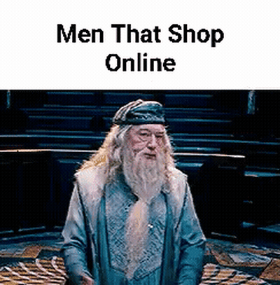 A Man With A Beard And A Hat Is Standing In A Room With The Words `` Men That Shop Online '' Above Him . GIF