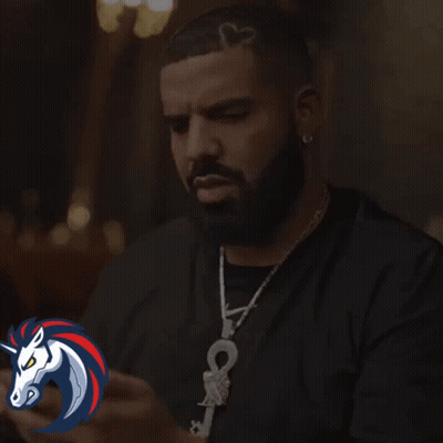 A Man With A Beard And A Heart In His Hair Is Saying Wow GIF