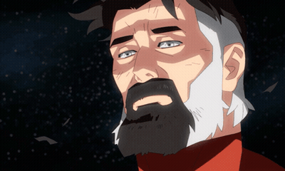 A Man With A Beard And A Red Shirt Is Looking Up At The Sky GIF