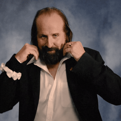 A Man With A Beard And A Ring On His Finger GIF