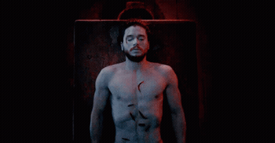 A Man With A Beard And A Scar On His Face Says I 'M Alive GIF