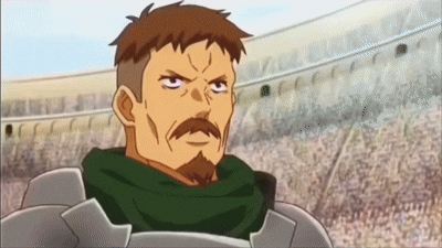 A Man With A Beard And A Scarf Around His Neck Is Looking At The Camera GIF