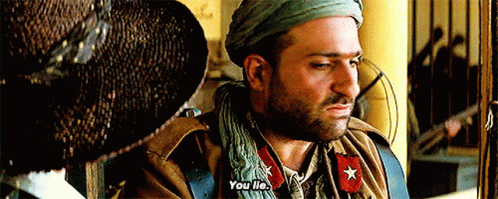 A Man With A Beard And A Scarf Around His Neck Says " You Lie " GIF