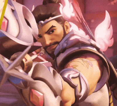 A Man With A Beard And A Tattoo On His Arm Is Holding A Bow And Arrow GIF