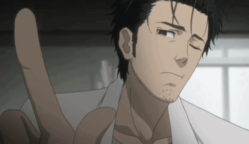 A Man With A Beard And A White Shirt Is Making A Face GIF