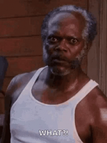 Bearded Man In White Tank Top Making Funny Face GIF