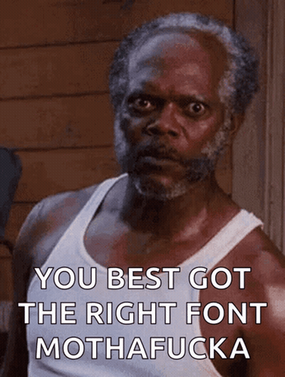 A Man With A Beard And A White Tank Top Says You Best Got The Right Font Mothafucka GIF
