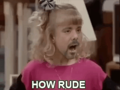 A Man With A Beard And Blonde Hair Is Wearing A Pink Shirt And A Girl 'S Bow Tie . GIF