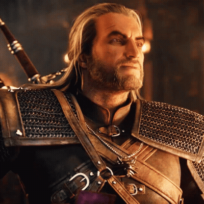 A Man With A Beard And Chain Mail Armor Holds A Sword GIF