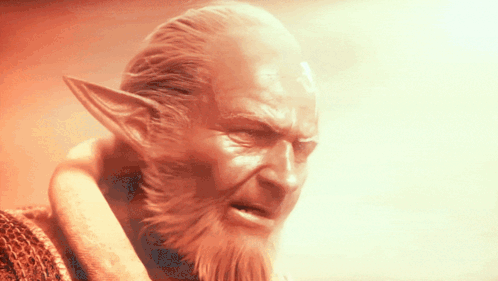 A Man With A Beard And Elf Ears Has A Very Angry Look On His Face GIF