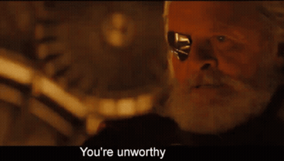A Man With A Beard And Eye Patch Says " You 'Re Unworthy " At The Bottom GIF