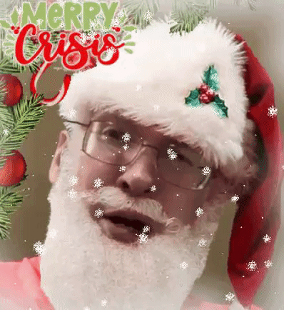 A Man With A Beard And Glasses Is Wearing A Santa Hat And A Christmas Wreath . GIF