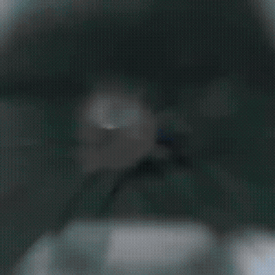 A Man With A Beard And Headphones Is Playing A Video Game .. GIF