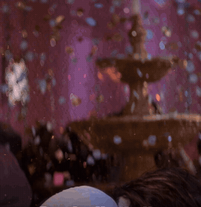 A Man With A Beard And Long Hair Is Laying On His Back GIF