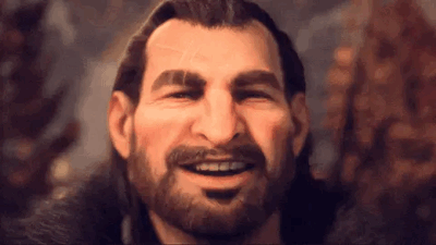 A Man With A Beard And Long Hair Is Smiling And Making A Funny Face . GIF