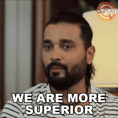 A Man With A Beard And Long Hair Says We Are More Superior GIF