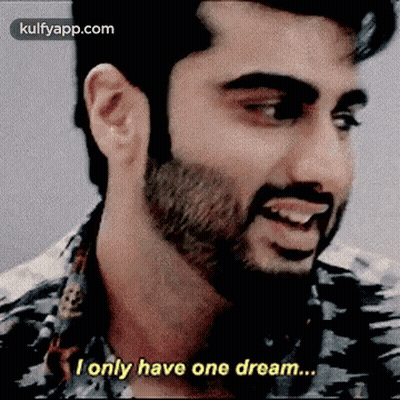 A Man With A Beard And Mustache Is Smiling And Saying `` I Only Have One Dream ... '' GIF