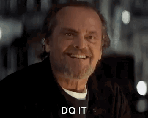 A Man With A Beard And Mustache Is Smiling And Says `` Do It '' . GIF