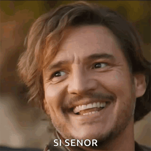A Man With A Beard And Mustache Is Smiling With The Words `` Si Senor '' Written On The Bottom . GIF