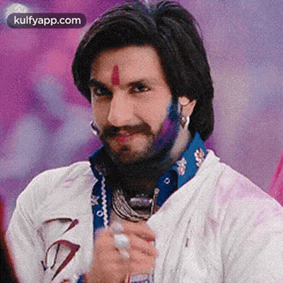 A Man With A Beard And Mustache Is Wearing A White Shirt And Holding A Glass . GIF