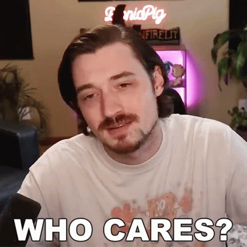A Man With A Beard And Mustache Says Who Cares GIF