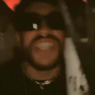 A Man With A Beard And Nose Ring Wears Sunglasses GIF