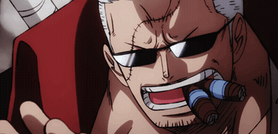 A Man With A Beard And Sunglasses Is Smoking A Cigar GIF