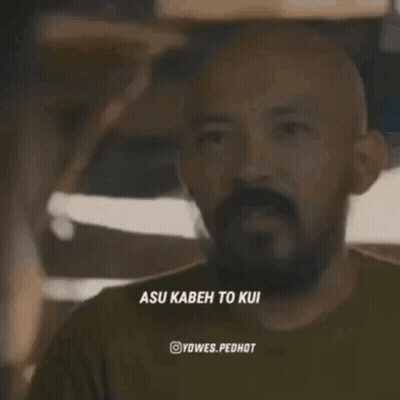 A Man With A Beard And The Words Asu Kabeh On The Bottom Right GIF