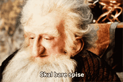 A Man With A Beard And The Words Skal Bare Spise Written Below Him GIF