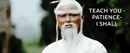A Man With A Beard And White Hair Is Standing In Front Of A Sign That Says " Teach You Patience I Shall " GIF