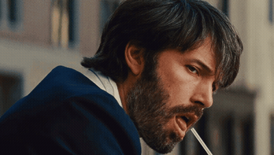 A Man With A Beard Drinking From A Straw GIF