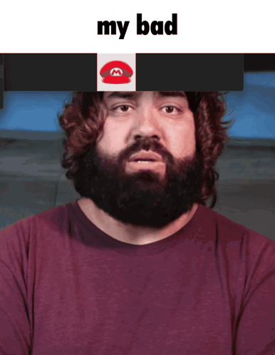 A Man With A Beard Has A Picture Of Mario On His Head And The Words " My Bad " Below Him GIF