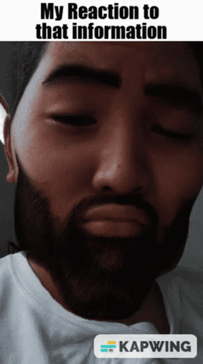 A Man With A Beard Has His Eyes Closed And A Caption That Says " My Reaction To That Information " GIF