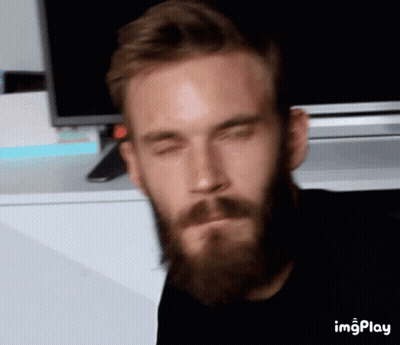 A Man With A Beard Has His Eyes Closed In Front Of A Tv And A Screen That Says Imgplay On It GIF
