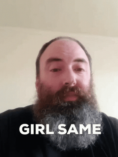 A Man With A Beard Has The Words Girl Same On His Face GIF