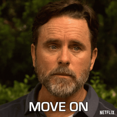 A Man With A Beard Has The Words Move On Written On His Face GIF