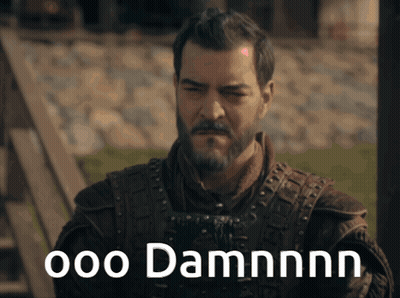 A Man With A Beard Has The Words Ooo Damnnn Written On His Face GIF