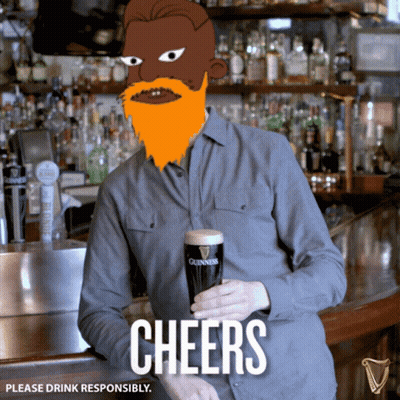 A Man With A Beard Holds A Glass Of Guinness Beer GIF