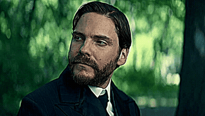 A Man With A Beard In A Suit And Tie GIF
