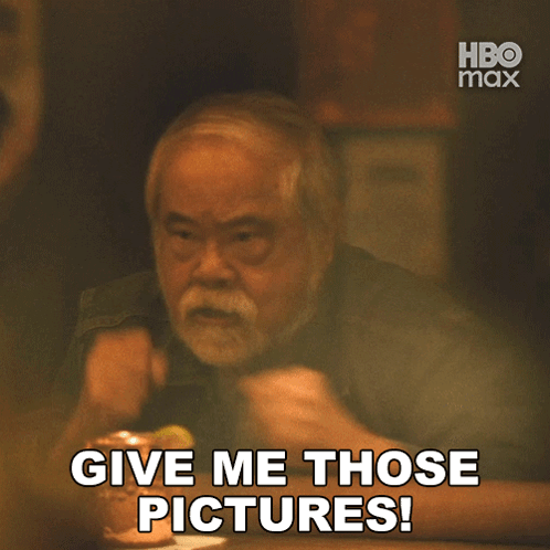 A Man With A Beard Is Asking For Pictures GIF